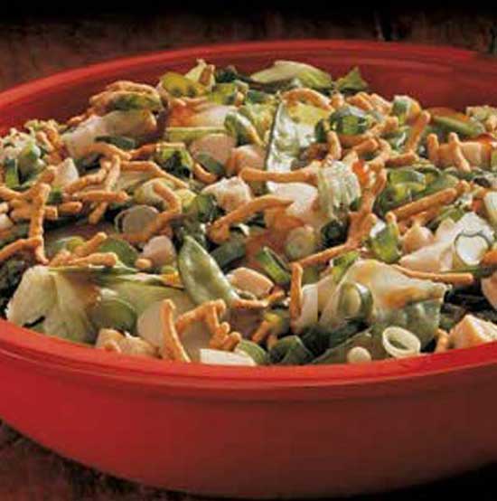 This satisfying Asian Cashew Chicken Salad is crunchy, nutty and sweet all at the same time. To speed up preparation, I use chow mein noodles instead of fried wonton wrappers called for in the original recipe.
