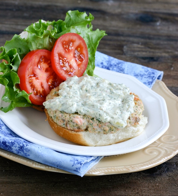 Use delicious and healthy fresh salmon to make these healthy Salmon Burgers with Dill Tartar Sauce. Yum!
