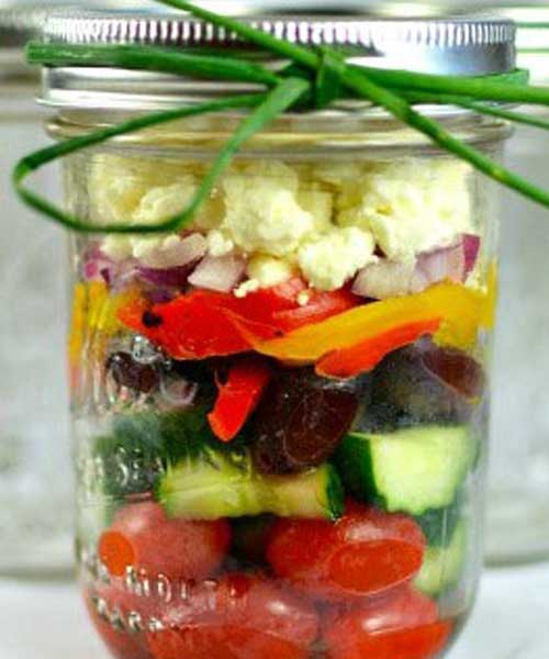Liven up that same old salad by layering those fresh ingredients into a Mason jar! Perfect for a party or grab and go for lunch, these Chunky Mediterranean Mason Jar Salads are jammed packed with flavor. Grab, go and enjoy!
