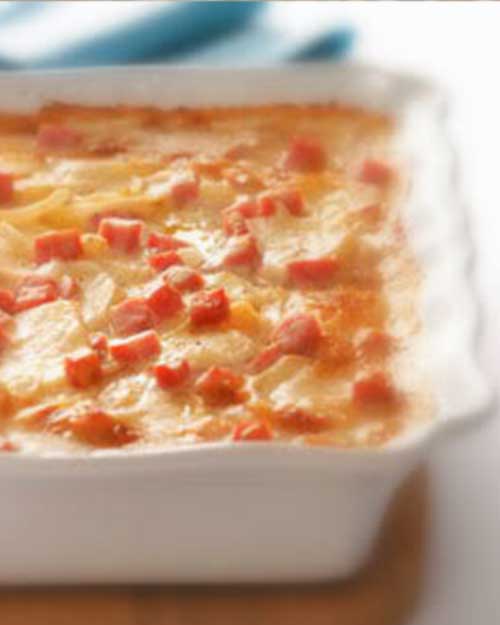 Recipe for Scalloped Potatoes with Ham and Cheese - Here is a good way to use up all of that leftover Easter ham that you know you will end up with.