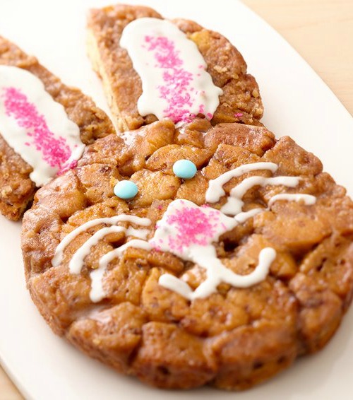 Recipe for Easter Bunny Monkey Bread - Easter bunny monkey bread is a festive way to present this breakfast favorite. Store bought cinnamon dough is rolled into balls and dipped into granulated sugar. This recipe quick, easy and oh so adorable.