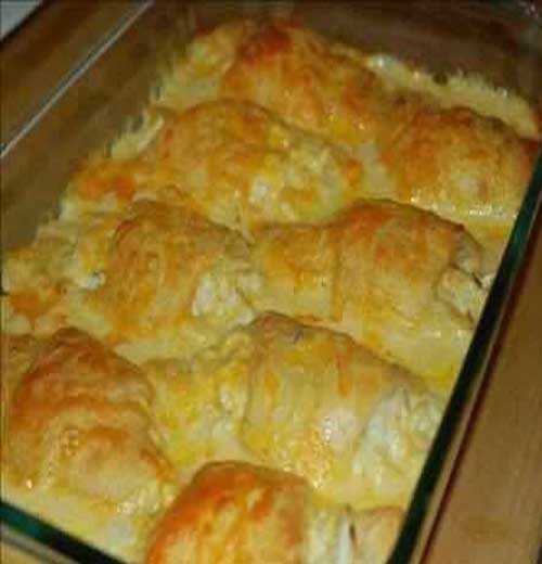 A tasty and hearty Chicken Crescent Roll Casserole to wrap up the winter. Chicken hidden underneath pillows of crescent rolls. Feed your crowd without breaking the bank.