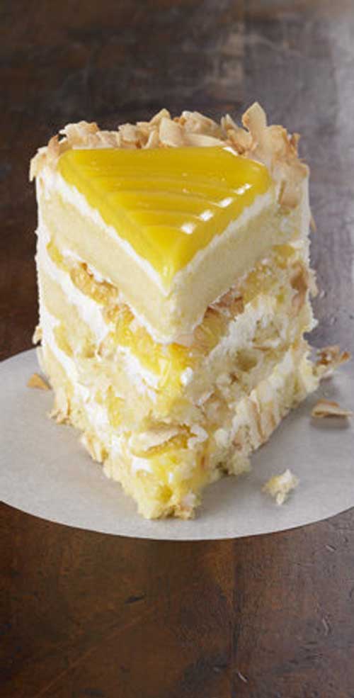 Tangy lemon filling between layers of tender white cake. Top it all off with a rich coconut-cream cheese frosting. Some people think that this Lemon Coconut Cake is the best cake they've ever eaten.