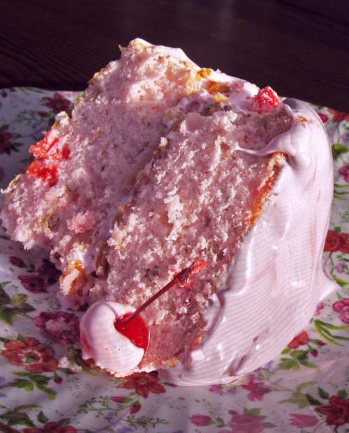 When I was a girl, I dreamed of this kind of cake, all pink and soft with fluffy pink cloud frosting. It was the cake that I imagined princesses ate. I had forgotten about those dreams until I ran across this recipe.