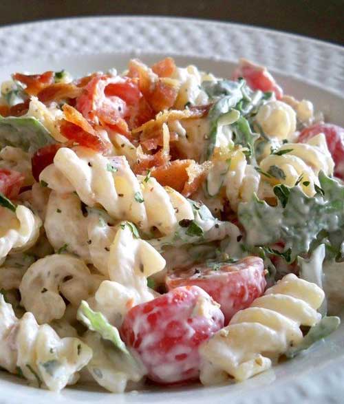 I humbly submit for your approval BLT Pasta Salad. It combines subtle herbs with peppery arugula and fresh tomatoes, all held together by a creamy base.
