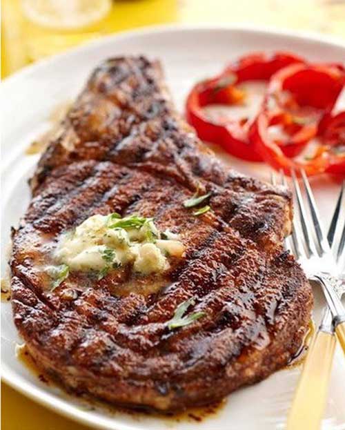 When it's nice outside, you can not go wrong with a perfectly grilled steak. And this Cowboy Rib Eye Steak and Whiskey Butter recipe is to die for. It's like meat heaven on a plate.
