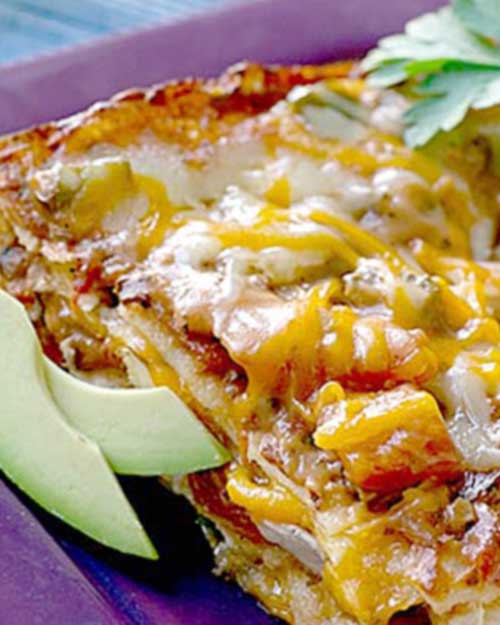 Recipe for Enchilada Lasagna - It’s our classic one-dish wonder. This Mexican casserole is like a big fat lasagna, with layers of tortillas instead of the traditional noodles.