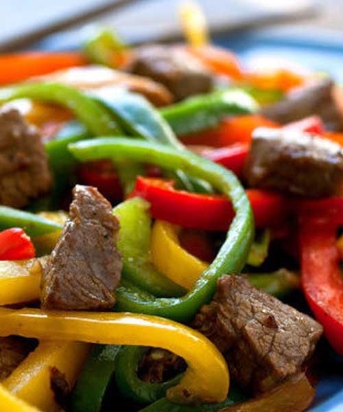 In this version of a stir-fry classic, Rainbow Beef, I am using less beef than a typical recipe would call for and adding in some shiitake mushrooms and extra peppers
