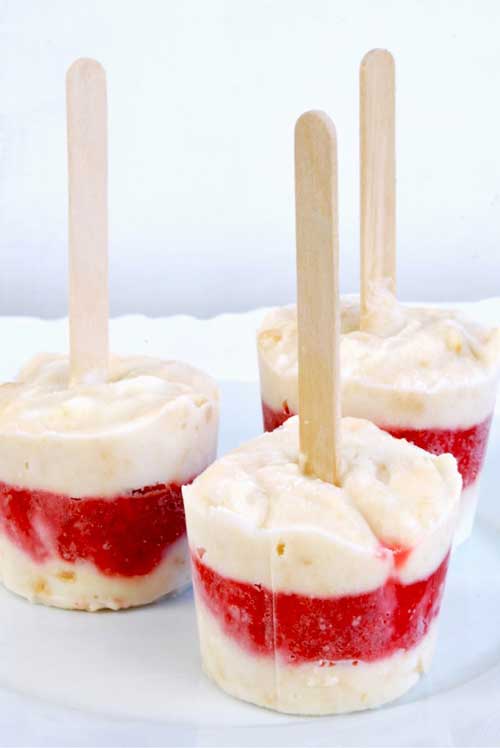 Recipe for Strawberry Shortcake Popsicles - The “shortcake” is actually Nilla wafers, the layering makes this a fun dessert for older kids to help with and the results will be adored by kids and grownups alike.