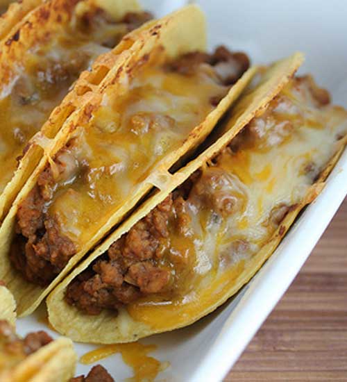 Recipe for Baked Tacos - I never thought about baking tacos in the oven before but it makes perfect sense. I really enjoyed how everything was warm and the cheese was melted.