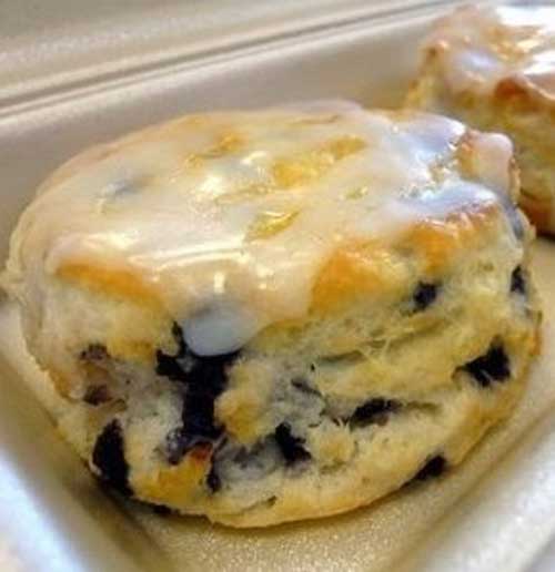 Does your breakfast usually consist of eggs and bacon or cold cereal and milk? Are you tired of eating the same ole food every single day? Why don’t you try your hand at making these delicious Glazed Blueberry Biscuits?