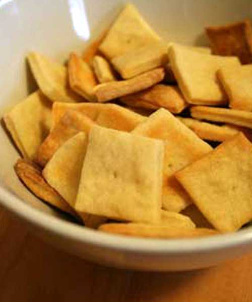 Recipe for Homemade Cheese Crackers - These are surprisingly easy, and I was impressed by how much like Cheez-its they taste. The hardest part was definitely rolling the dough thin enough to produce a sufficiently crispy cracker.
