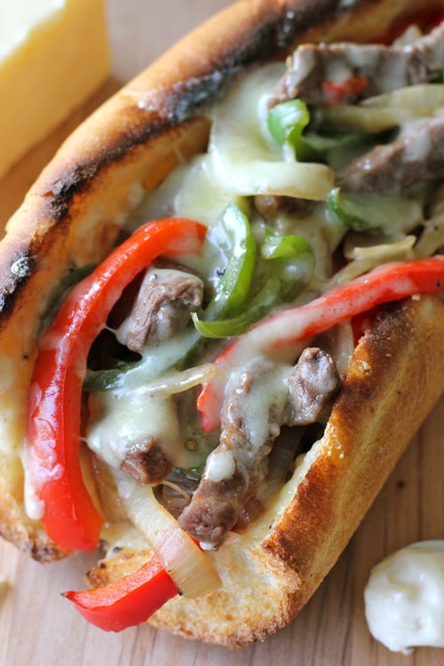 Recipe for Philly Cheesesteak with Garlic Aioli - The garlic aioli served as a wonderful complement to the meaty goodness along with the creamy, crumbly cheese. I really loved that the flavors melded so well together.