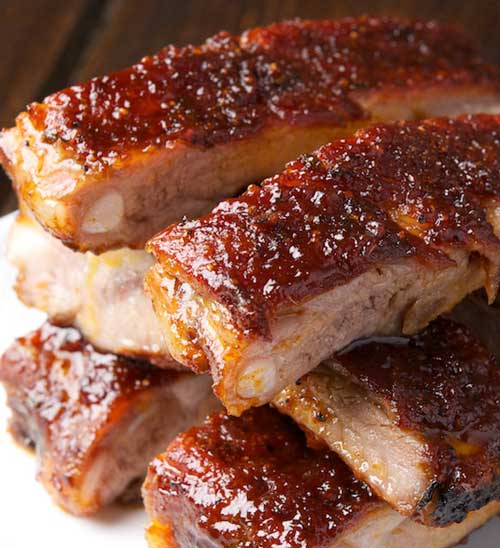 Recipe for St. Louis Ribs with Maple BBQ Sauce - Trying to re-create this life-changing plate of meat and bones at home, I stumbled across a pretty tasty sounding maple syrup BBQ sauce, and from her description of the ribs I guessed them to be the meaty St. Louis variety.