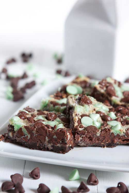 Recipe for Mint Chocolate Double Delicious Cookie Bars - Wanting a chocolate and mint dessert? This recipe has just four ingredients. There is also no stirring, mixing, or anything else to it. Sounds perfect to me!