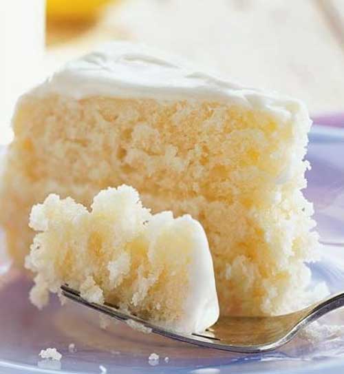 Recipe for Lemonade Layer Cake - Thawed lemonade concentrate adds bold, fun flavor to this tart layer cake. This cake is the perfect solution to summer birthday parties or events when you need to wake up your taste buds.