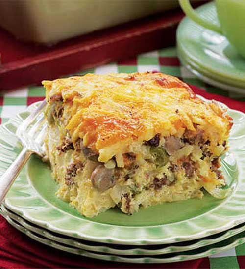 Recipe for Company Breakfast Casserole - For a southwest flair, replace the mushrooms with a small can of sliced olives, add Monterey Jack cheese instead of Cheddar and serve with spicy salsa on the side.