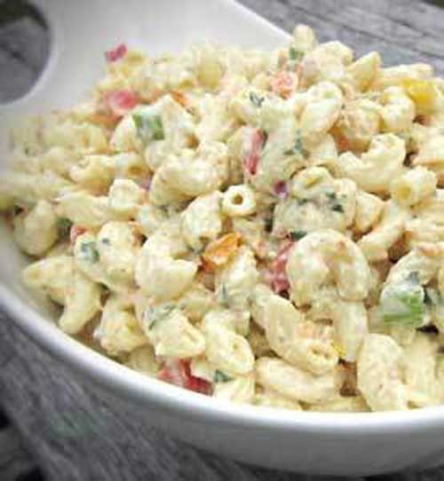 This Party Macaroni Salad recipe makes a great side dish for any summer barbecue or picnic. Make it in advance and refrigerate it for at least two hours.