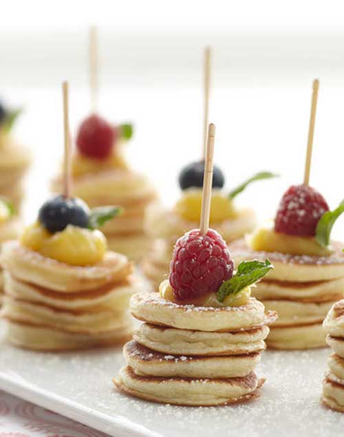 These Mini Pancake Stacks would be a cool way to display breakfast in the morning for guests or for a shower!