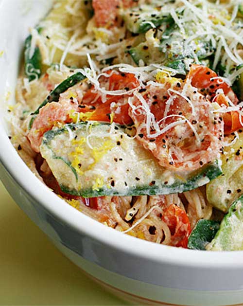 A quick and easy no guilt summer dish. This Pasta with Zucchini Tomatoes and Creamy Lemon Yogurt Sauce may just become your family's next favorite.