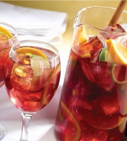 Tea is perfect for these hot summer days. Add some fruit juice to it, and it magically becomes this even more perfect Sparkling Sangria Tea!