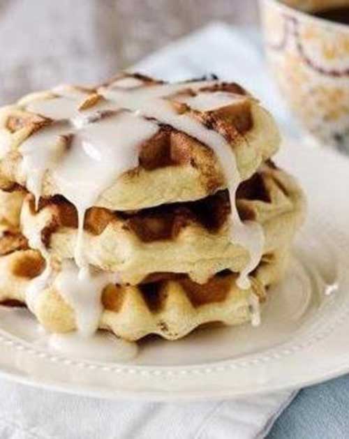These Cinnamon Roll Waffles with Cream Cheese Glaze are sure to change up the weekend cinnamon roll routine. Your not even gonna believe how easy they are to make!