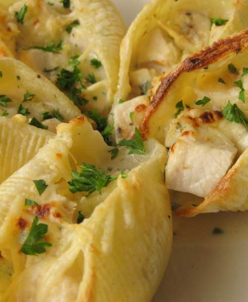 These Chicken Alfredo Stuffed Shells, filled with warm, gooey cheese, are always popular. The tender chicken and rich sauce make the dish so satisfying, you may just not be able to make enough of them!