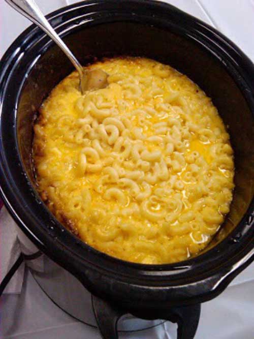 Gooey gooey cheesy goodness does not get any easier than this Crockpot Mac n Cheese. A few pinners even said it was "Life changing!"