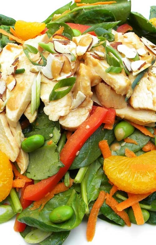 Loaded with fresh, vibrant veggies, tender poached chicken and a flavorful dressing, this Asian Chicken and Spinach Salad makes for a satisfying meal.