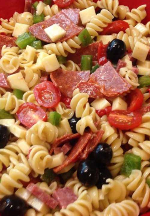 This Awesome Pasta Salad is the best pasta salad I’ve ever eaten, and people request it frequently. It’s a very easy, light side dish for a picnic or dinner.