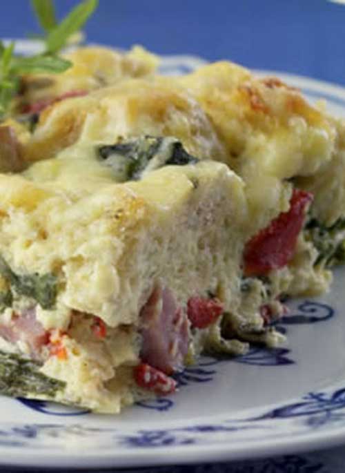 This Ham and Cheese Breakfast Casserole is a healthy update of a traditionally rich ham-and-cheese breakfast strata has plenty of flavor, with half the calories and one-third the fat of the original.