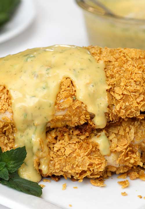 This Crusted Honey Mustard Chicken is a total comfort food with the crunchy breading and delicious sauce, and a good alternative to just plain baked chicken.