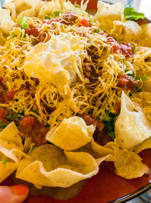 The chili is cooked in the crockpot and the rest of this Deli Style Taco Salad just takes a few minutes to create so it’s pretty easy!