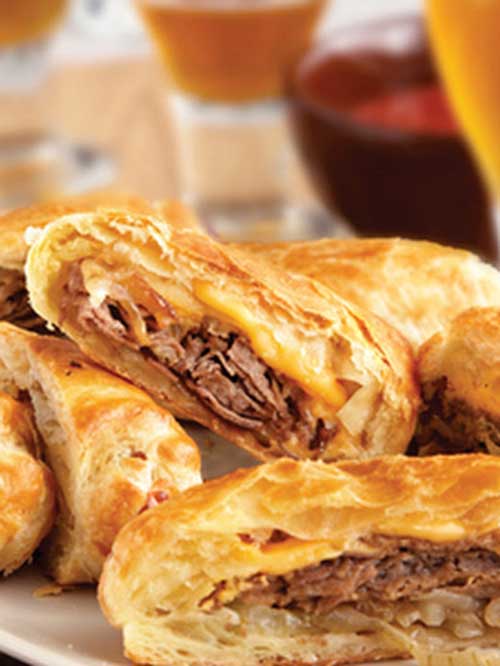These upscale Philly Cheesesteak Rolls feature flaky puff pastry instead of ordinary rolls.  They're easy to make, and even easier to enjoy!