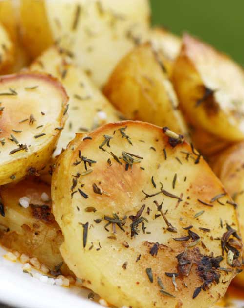 Roasted to perfection with lemon, oregano and garlic. These Garlic and Oregano Roasted Potatoes are sure to have your family asking for seconds.