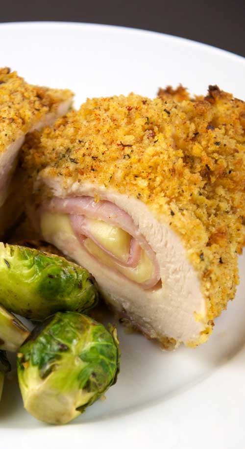 What could be better then chicken stuffed with ham and melted cheese?! Almost nothing, that's why this Chicken Cordon Bleu recipe is such a classic.