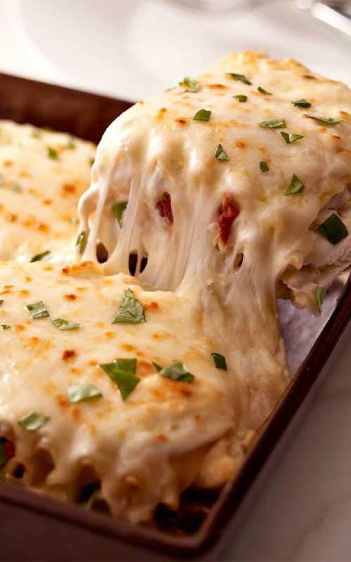 If you love cheesy, creamy goodness, then you will love this Creamy White Chicken Lasagna recipe that takes lasagna to a whole new level!