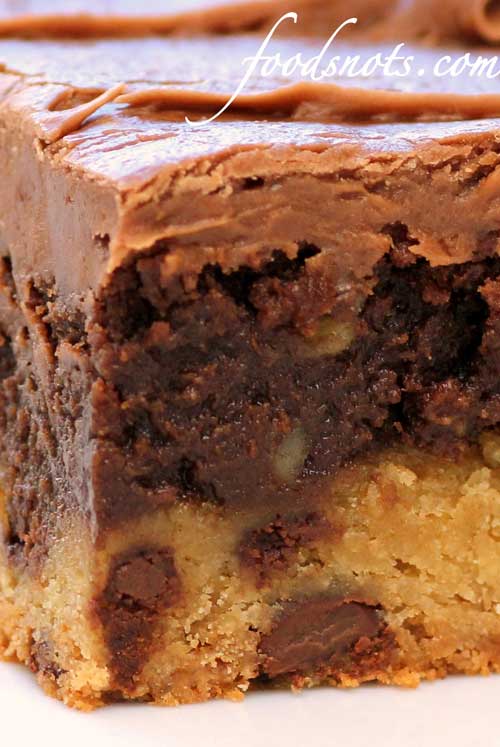 Oh my gosh!! Really? Chocolate chip cookie, brownie, and chocolate frosting!! These Frosted Cookie Brownies had my mouth watering just looking at the picture!