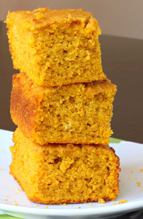 This pumpkin cornbread isn't overly pumpkin-y; it has just the right amount of pumpkin flavor hanging out in the background. It's perfect served with a drizzle of honey on top, alongside a bowl of chili!
