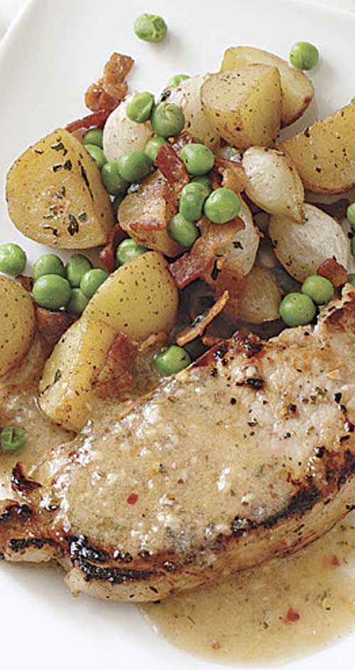 The key to timing this White Balsamic Pork Chops with Roasted Potatoes is to marinate the pork first and then prep and cook the potatoes.