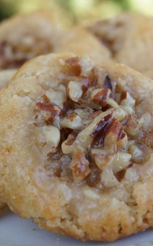 One of my favorite pies in changed up to be cute little Pecan Pie Thumbprint Cookies YUM!
