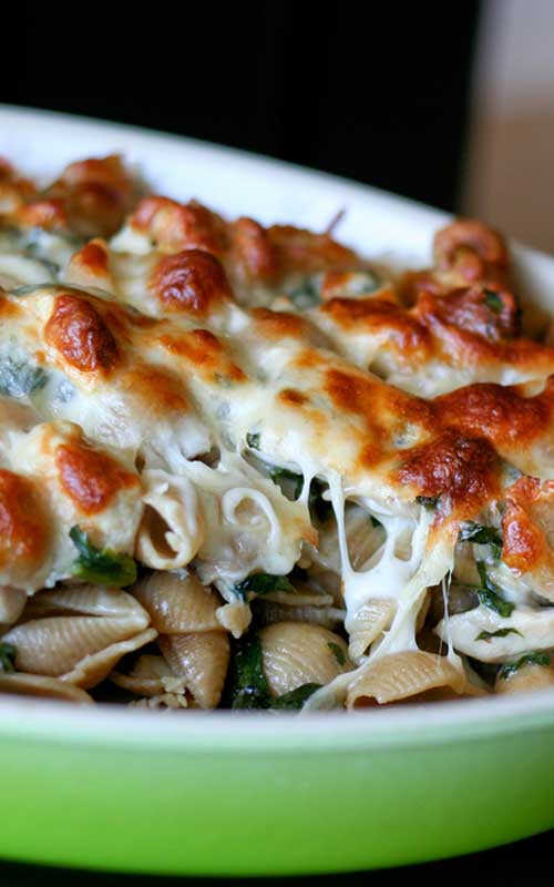 This Baked Chicken & Spinach Pasta is one of those things my mom made all the time when I was growing up and my brother and I loved like crazy.