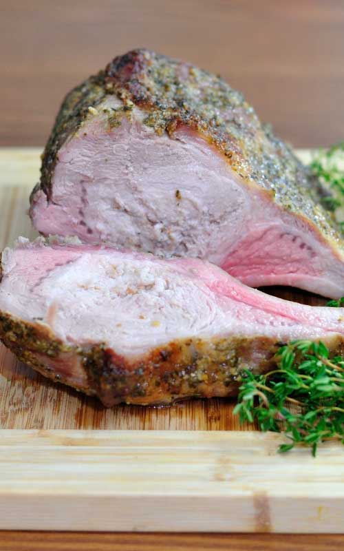 A Slow-Roasted Pork Rib Roast is the pork version of a beef rib roast: juicy, delicious, and impressive, but without the impressive price.
