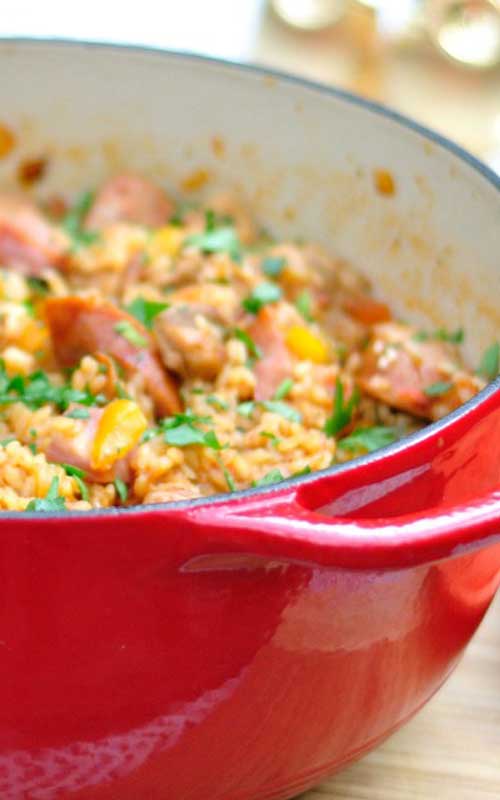 This spicy Jambalaya with Chicken, Sausage, and Ham will probably go over like gangbusters, but without leaving you with too many dishes to wash.