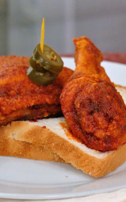 If you’ve never had Nashville hot chicken, you’re in for an experience. Crisp fried chicken coated in a smoking hot paste of cayenne pepper and spices. YUMMY!