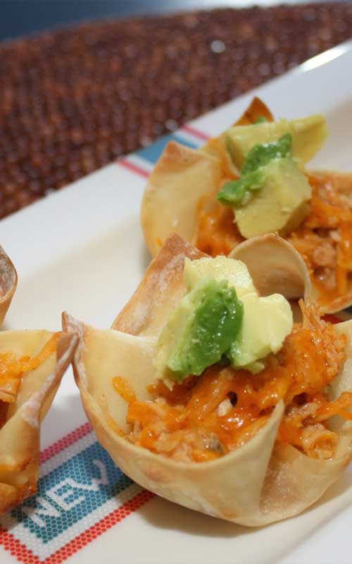 These individual chicken enchilada cups will absolutely thrill your family. Everything you love about chicken enchiladas, piled into a few bites!