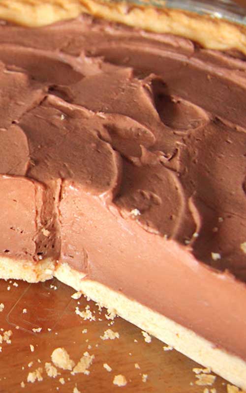 A decadent, tempting Easy Chocolate Kahlua Cheesecake with the taste of coffee liqueur...and it comes together in minutes! What could be better?