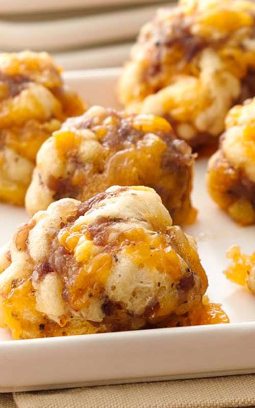 These little Sausage Cheese Balls make a big hit with any crowd. They continue to be one of our most-requested recipes!