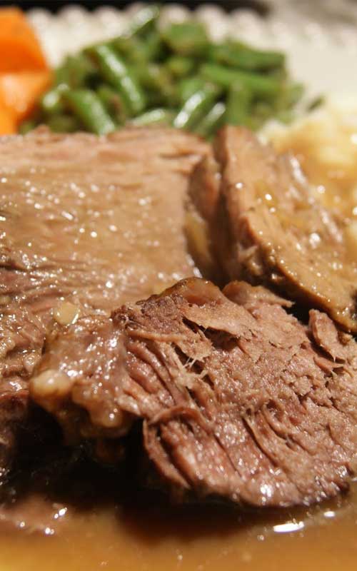 Recipe for Slow Cooker Pot Roast - Get a head start on dinner with this fresh take on a slow- simmered, all-in-one meal that makes clean-up a breeze.