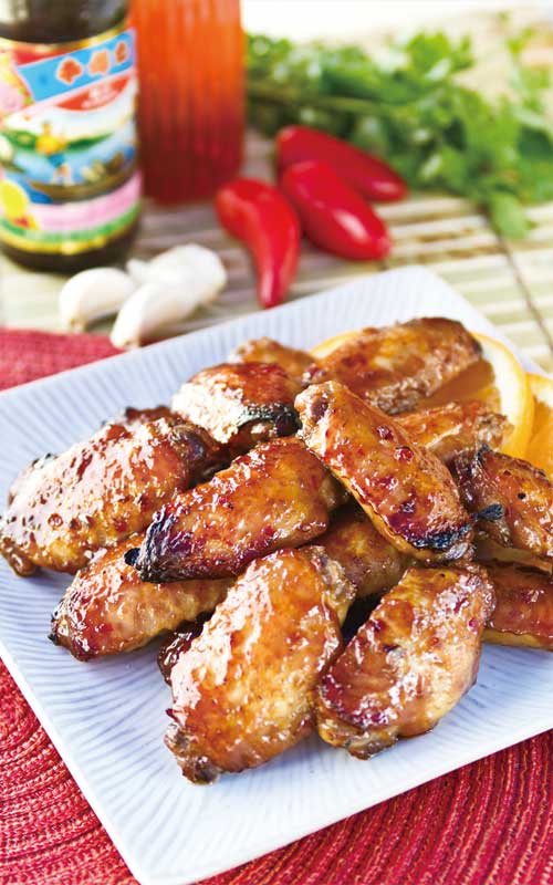 No Superbowl party food table would be complete without BBQ wings, and we simply love this Spicy Chicken Wings with Sriracha Chili Sauce recipe. And, they're easy to make!